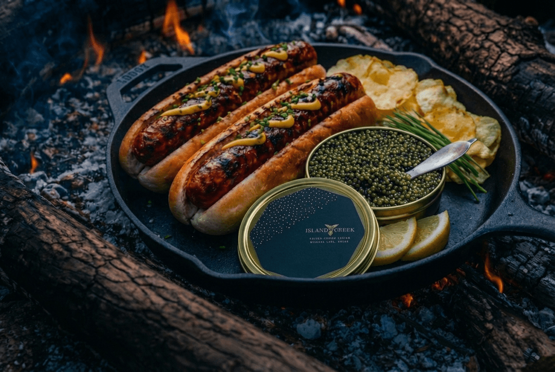 Black-label Wagyu hot dog with caviar prepared at the Menizei campfire